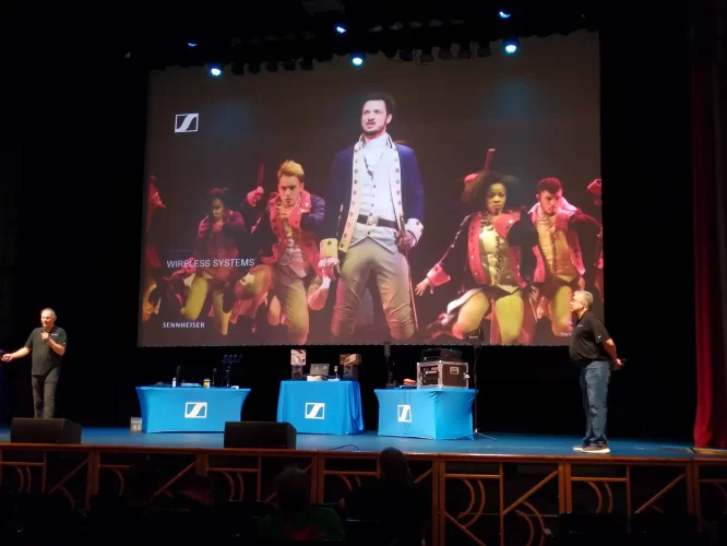 Slide from the Sennheiser "How to Use a Wireless Mic" presentation featuring the actors from 'Hamilton' wearing Sennheiser wireless microphones.